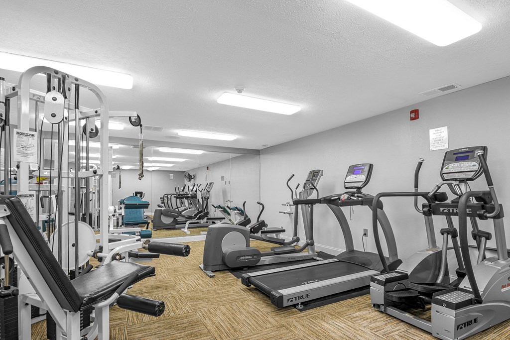 a gym with various cardio equipment at Pheasant Run Apartments, Lafayette, IN, 47909