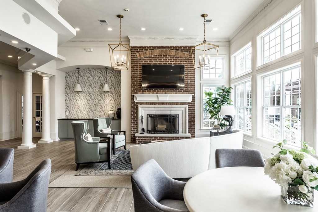 TV seating and coffee bar in the clubhouse at Alexandria of Carmel Apartments, Carmel, IN, 46032
