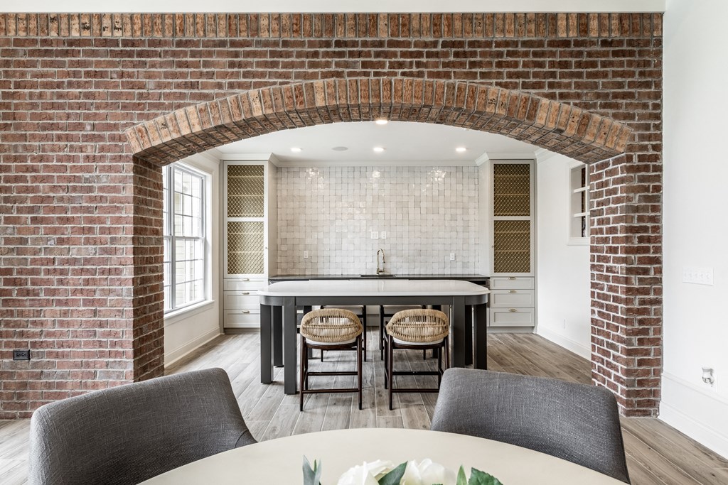 Kitchenette with island in the clubhouse  at Alexandria of Carmel Apartments, Carmel, Indiana