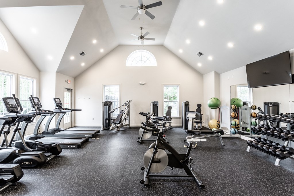 Fitness center with equipment at Alexandria of Carmel Apartments, Indiana