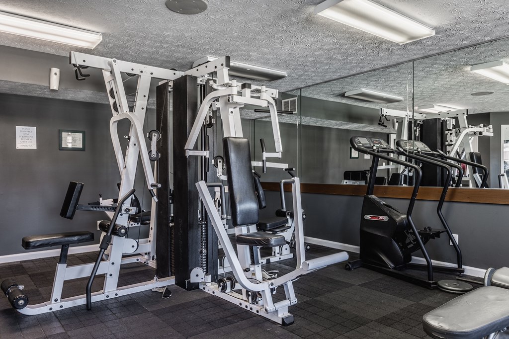 a gym with various exercise equipment at Bavarian Village Apartments, Indianapolis, Indiana
