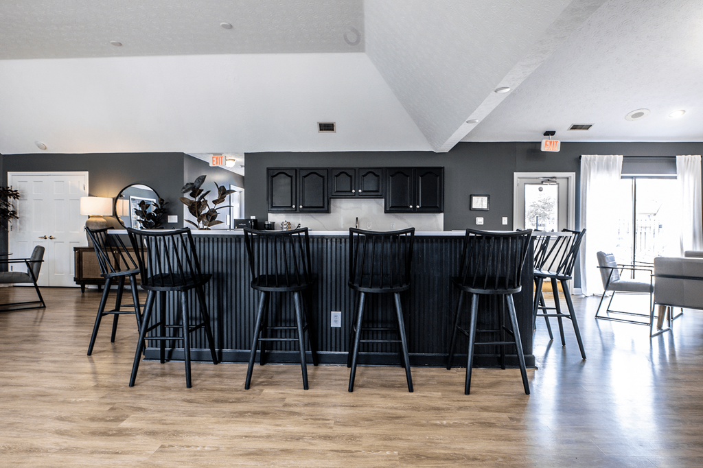 our apartments showcase an open concept living room with a kitchen and dining area at Bavarian Village Apartments, Indiana, 46235