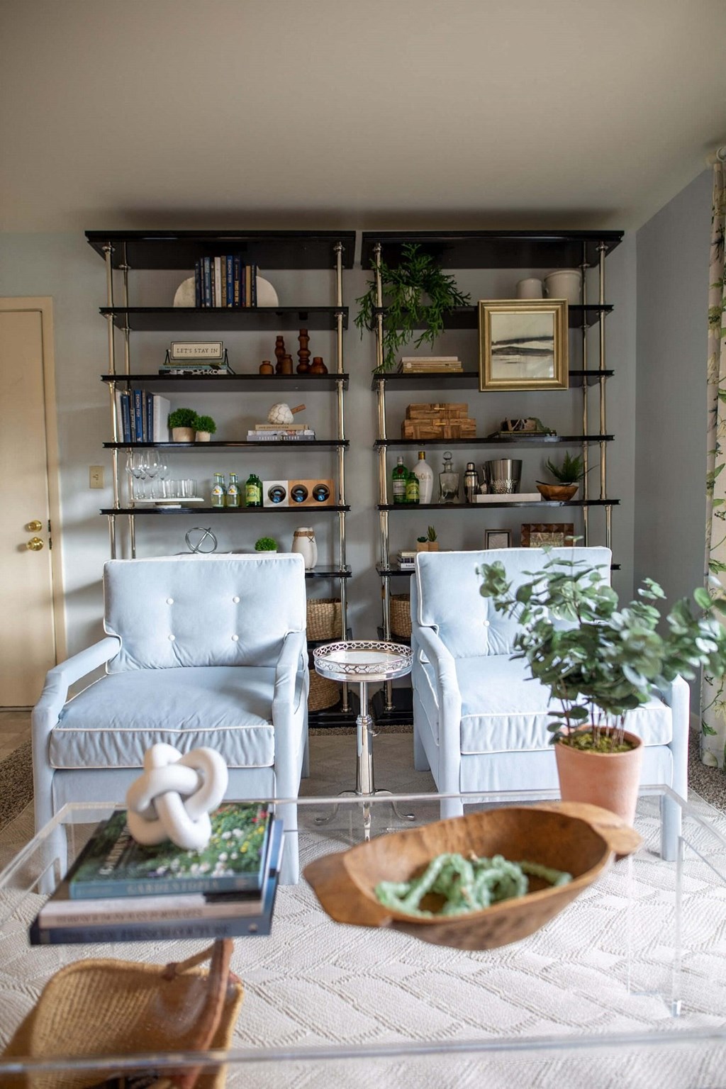 a living room with two chairs and a table at Bay Pointe Apartments, Indiana, 47909