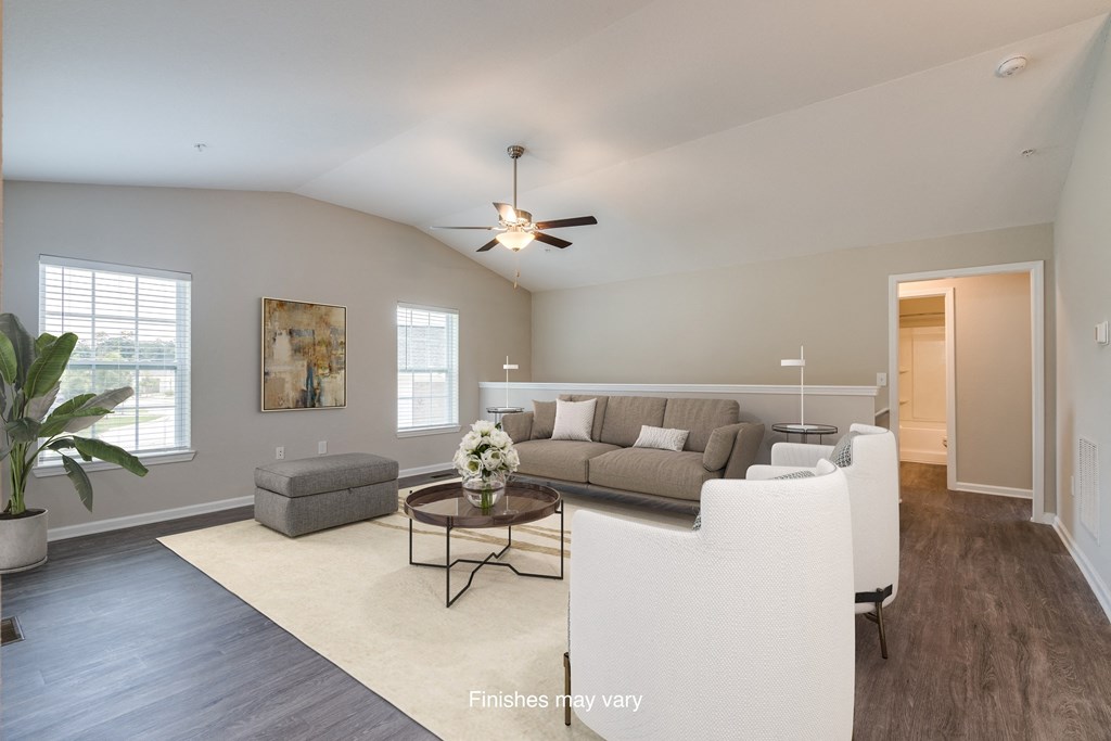 a living room with a couch and a coffee table  at Killian Lakes Apartments and Townhomes, Columbia, 29203