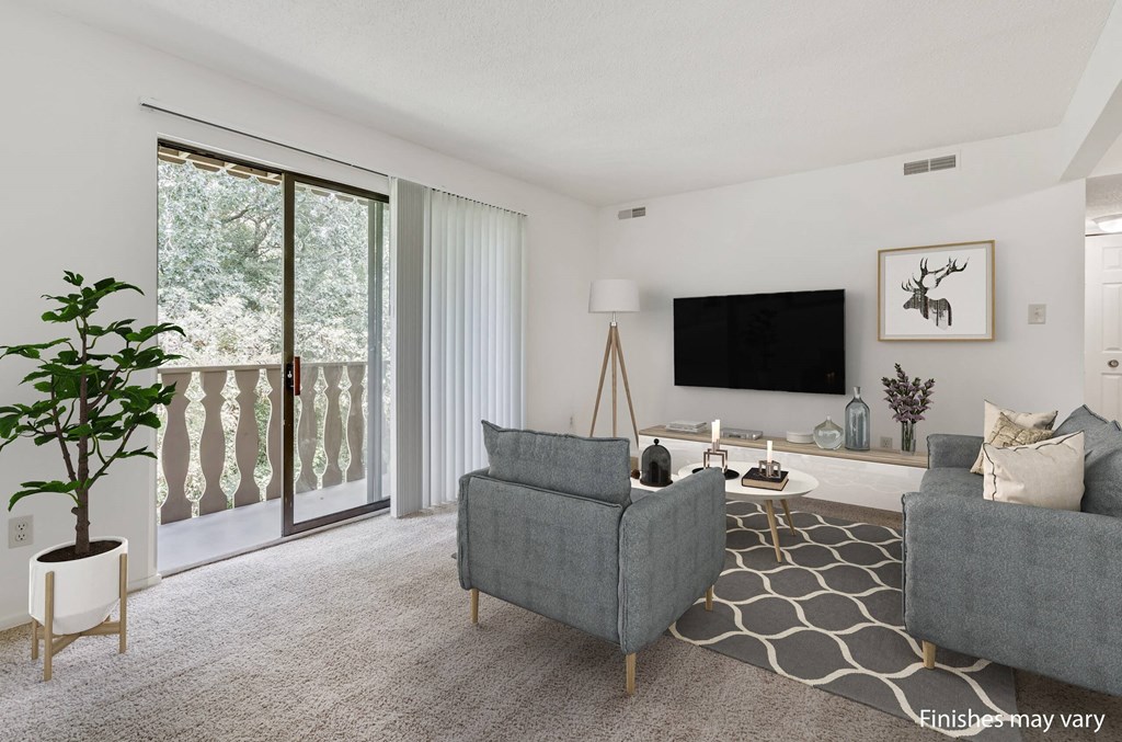 Orchid Layout Living Room with Balcony Access at Lake in the Pines, Fayetteville, North Carolina