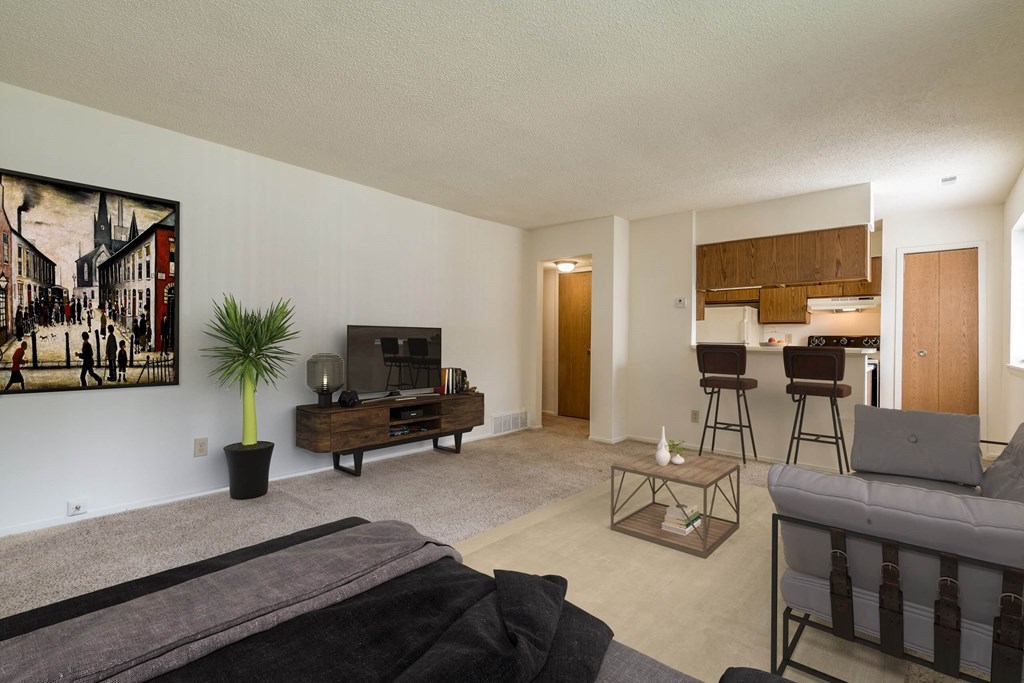 Larkspur Layout Living Room with Kitchen View at Lake in the Pines, Fayetteville 28311