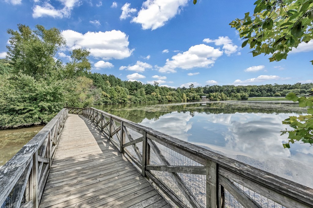 Wooden Bridge surrounded by lake and greenery at Enclave Apartments, Virginia, 23114