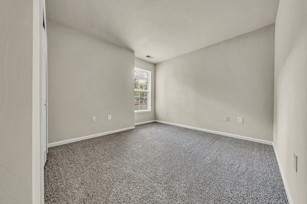 Empty Living Room with window view at Enclave Apartments, Virginia