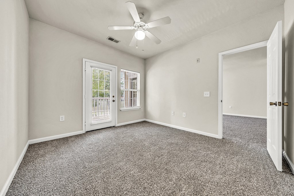 Empty Living Room with ceiling fan at Enclave Apartments, Midlothian