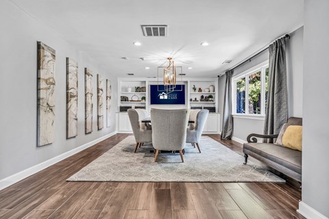 a dining room with a table and chairs and a window at Trophy Club at Bellgrade, Midlothian, VA, 23113