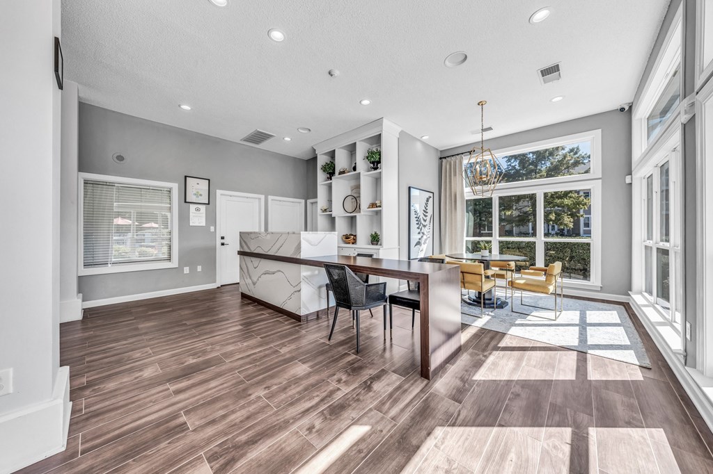 a dining room with a glass table and a large window at Trophy Club at Bellgrade, Midlothian, VA, 23113