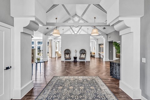 a large living room with a fireplace and a rug at Trophy Club at Bellgrade, Midlothian, VA, 23113
