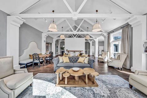 a living room with couches and chairs and a table at Trophy Club at Bellgrade, Midlothian, VA, 23113