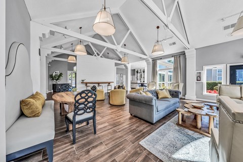 a living room with couches and chairs and a fireplace at Trophy Club at Bellgrade, Midlothian, VA, 23113
