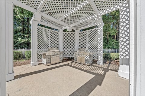 two bbq areas under a white gazebo with two grills at Trophy Club at Bellgrade, Midlothian, VA, 23113