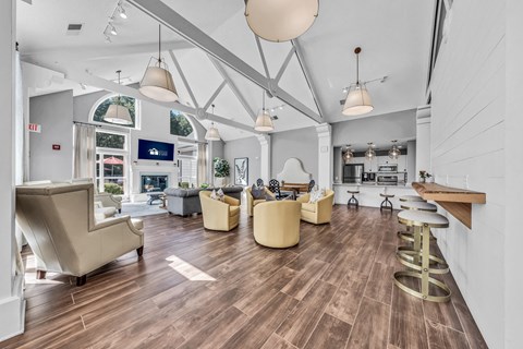 a large living room with couches and chairs and a fireplace at Trophy Club at Bellgrade, Midlothian, VA, 23113