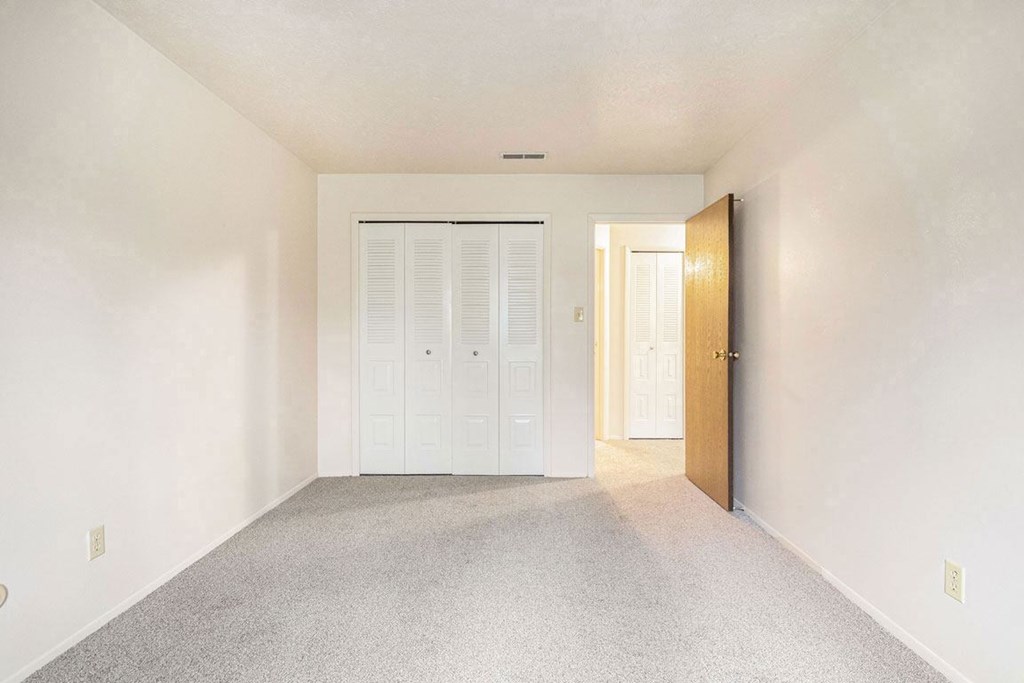 bedroom with a a large closet
