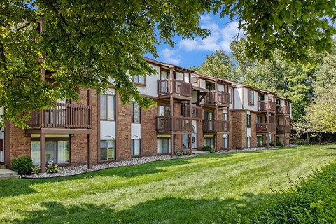 Brick apartment buildings with private balconies at Granada Apartments, Jackson, 49202
