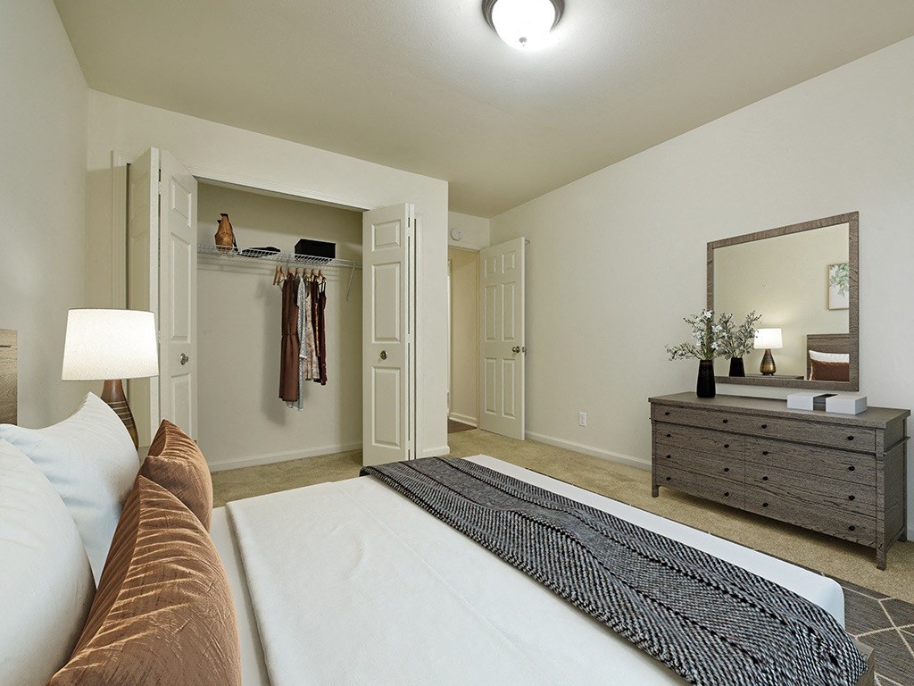 Bedroom With Closet at Grand Bend Club Apartments, Grand Blanc, MI
