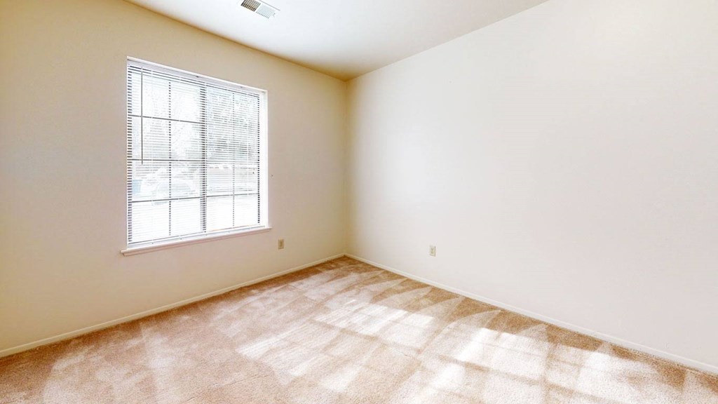 Carpeted Bedroom at Hampton Lakes Apartments, Walker, MI, 49534