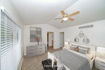 Master Bedroom with Vaulted Ceiling at Foxwood Apartments and The Hermitage Townhomes, Portage, MI 49024