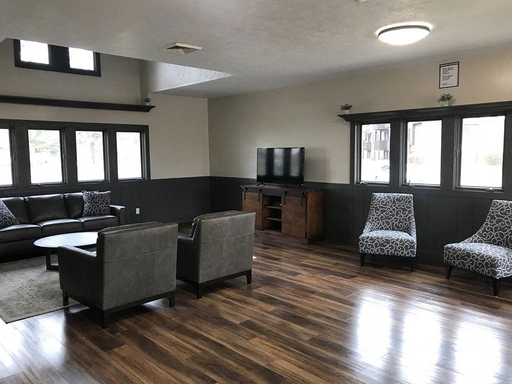 Posh Lounge Area In Clubhouse at Hickory Village Apartments, Mishawaka, IN