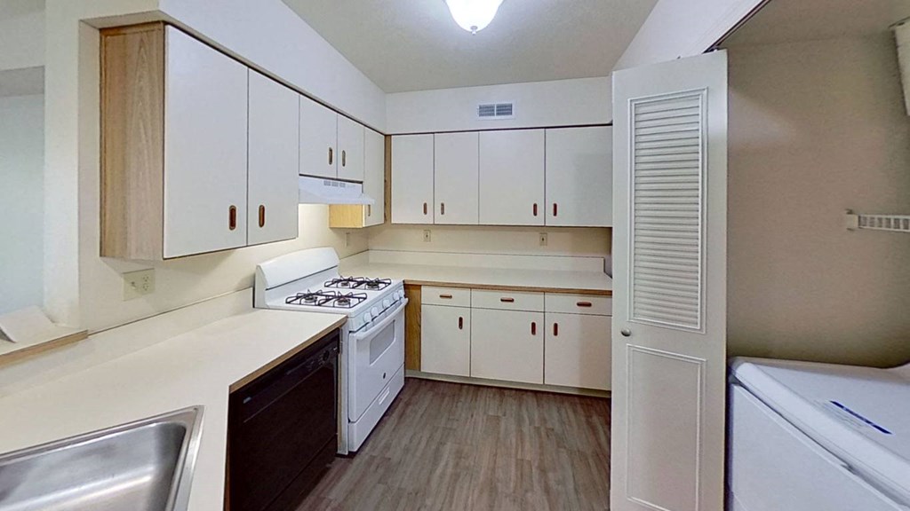 Kitchen with Dishwasher at The Highlands Apartments, Indiana
