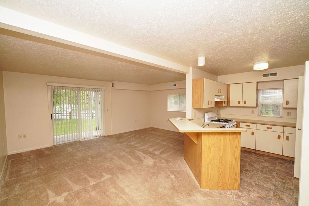 Enlarged living room with extra windows at Huntington Cove Apartments, Merrillville, 46410