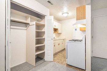 a kitchen with a large closet with shelves at Irish Hills Apartments, South Bend, 46614