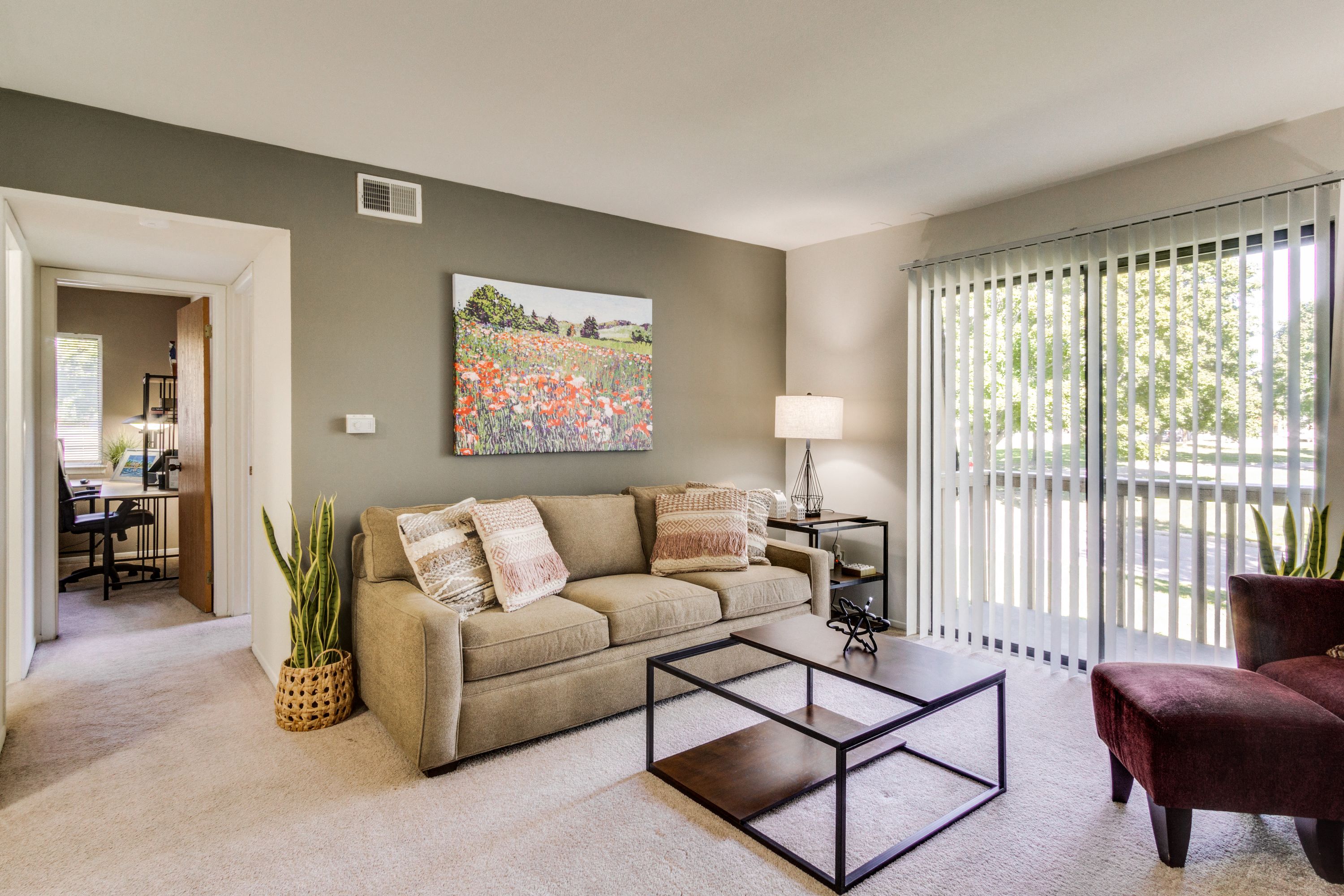 a living room with a couch and a coffee table