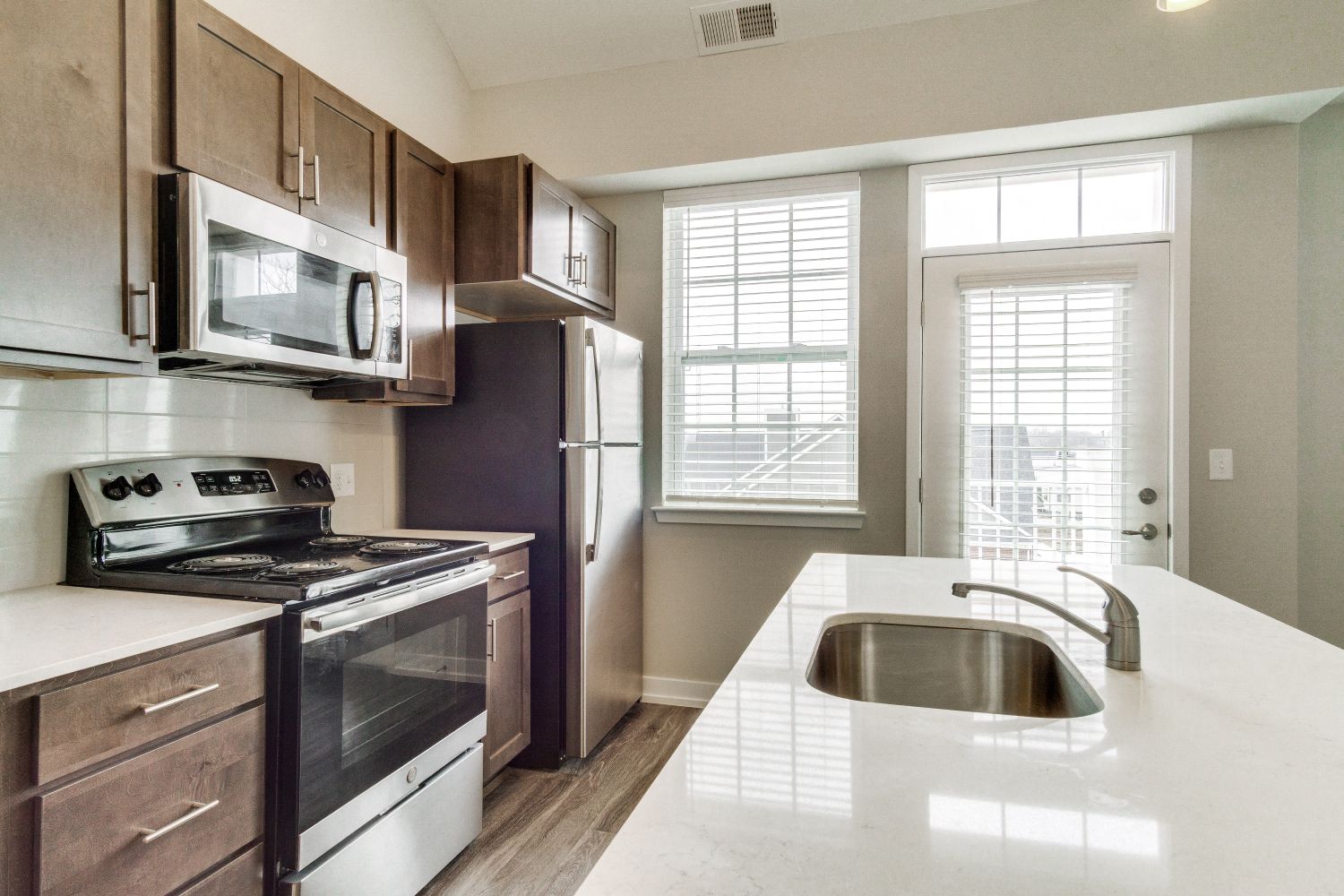 Kitchen (Hickory) at Village Place Apartments, Romeoville, 60446