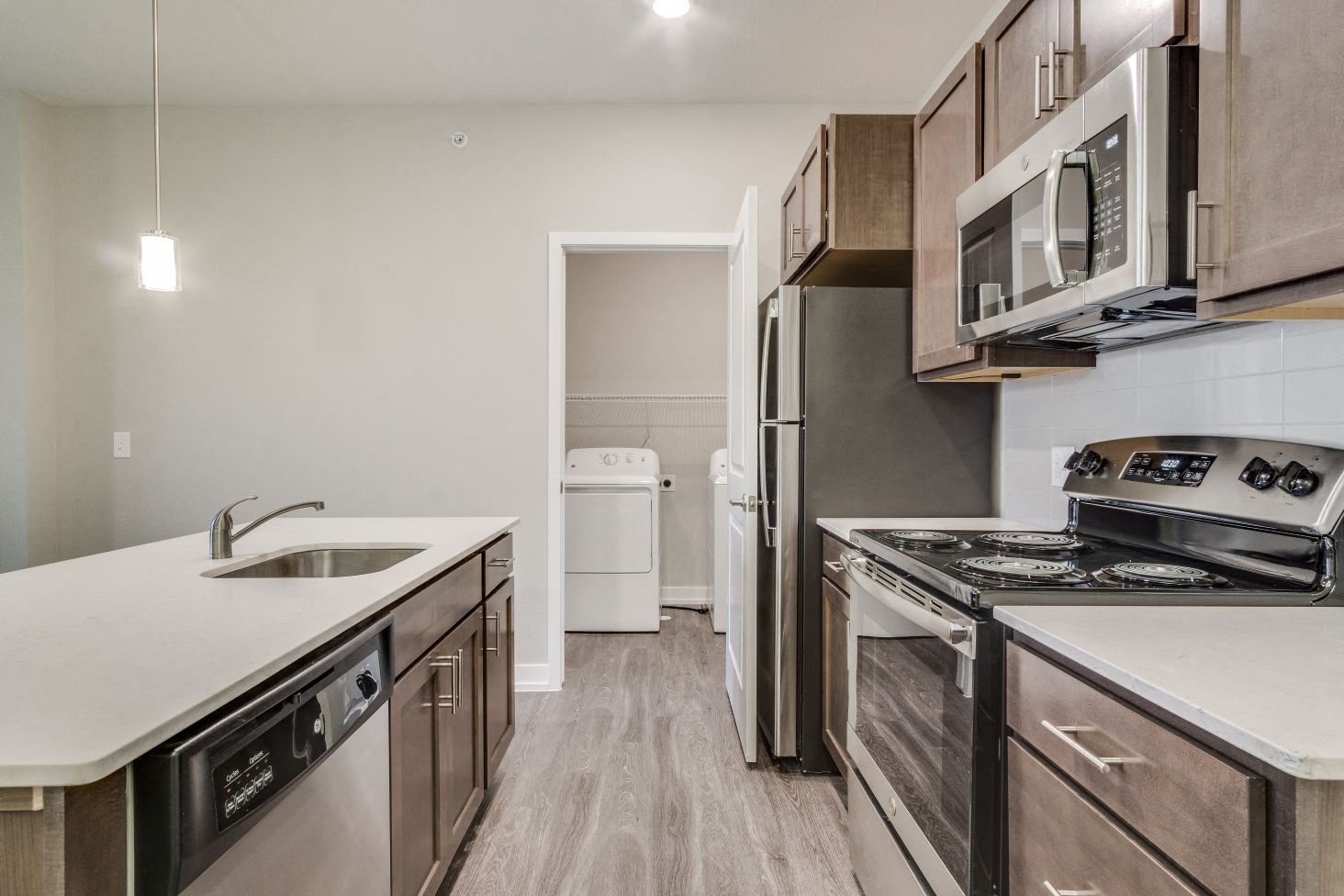 Kitchen and Full-Size Washer & Dryer (Spruce) at Village Place Apartments, Romeoville, 60446