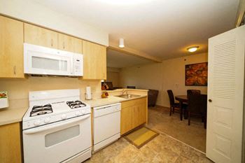 Kitchen with Breakfast Bar at Fieldstream Apartment Homes in Ankeny, Iowa