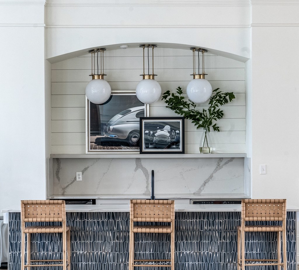 a bartop with chairs at Latitudes Apartments, Indiana, 46237