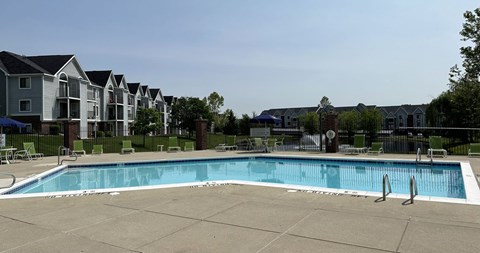 Relaxing Swimming Pool with Lounge Chairs at Liberty Mills Apartments, Fort Wayne, IN, 46804
