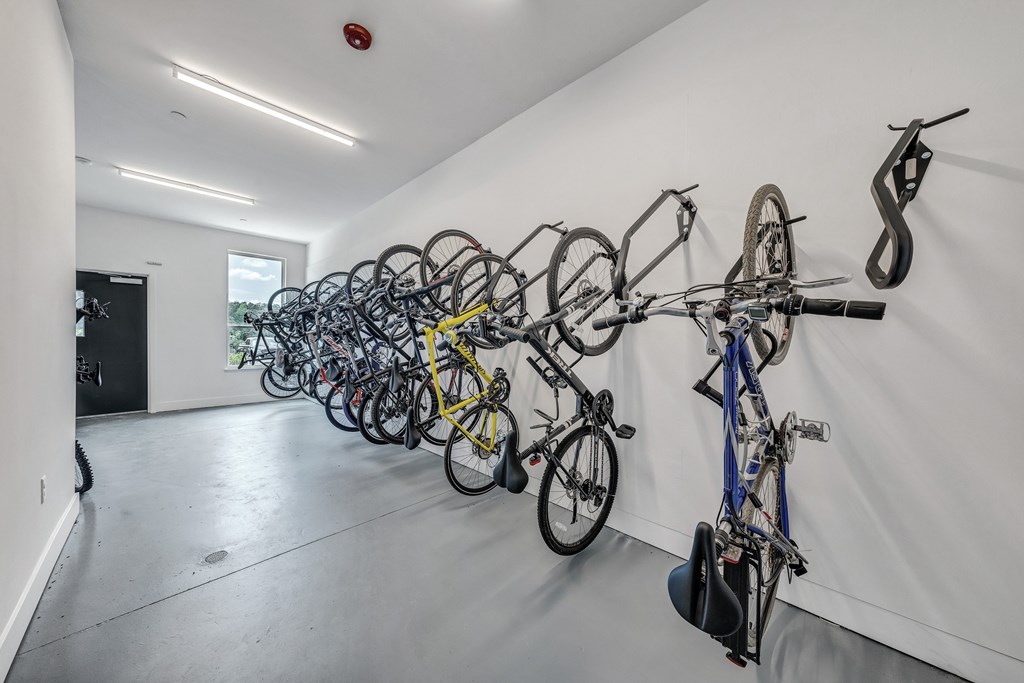 A bike rack with many bikes on it.