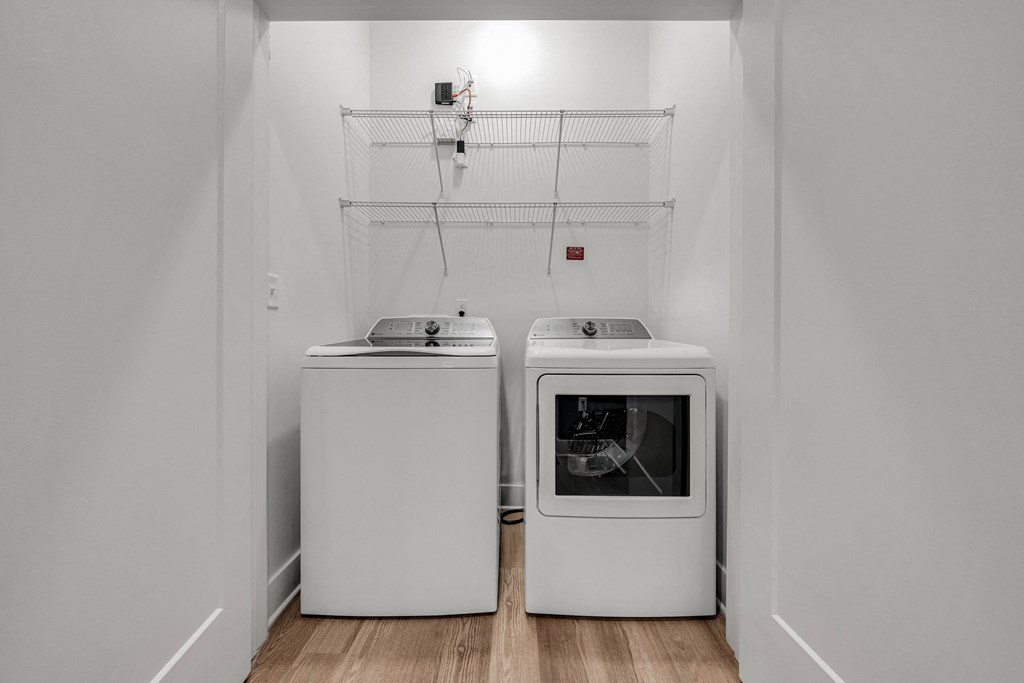 A white kitchen with a dishwasher and an oven at Luxe 360 on Centerpointe Apartments, Midlothian, VA, 23114