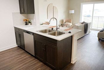 Modern Apartments with Hardwood Style Flooring at Meadowbrooke Apartment Homes in Grand Rapids, MI 49512