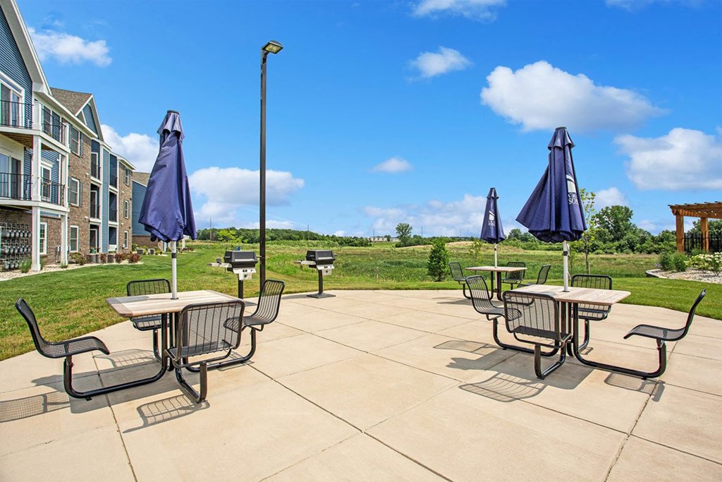 Grilling Stations with Seating at Meadowbrooke Apartment Homes in Grand Rapids, MI 49512