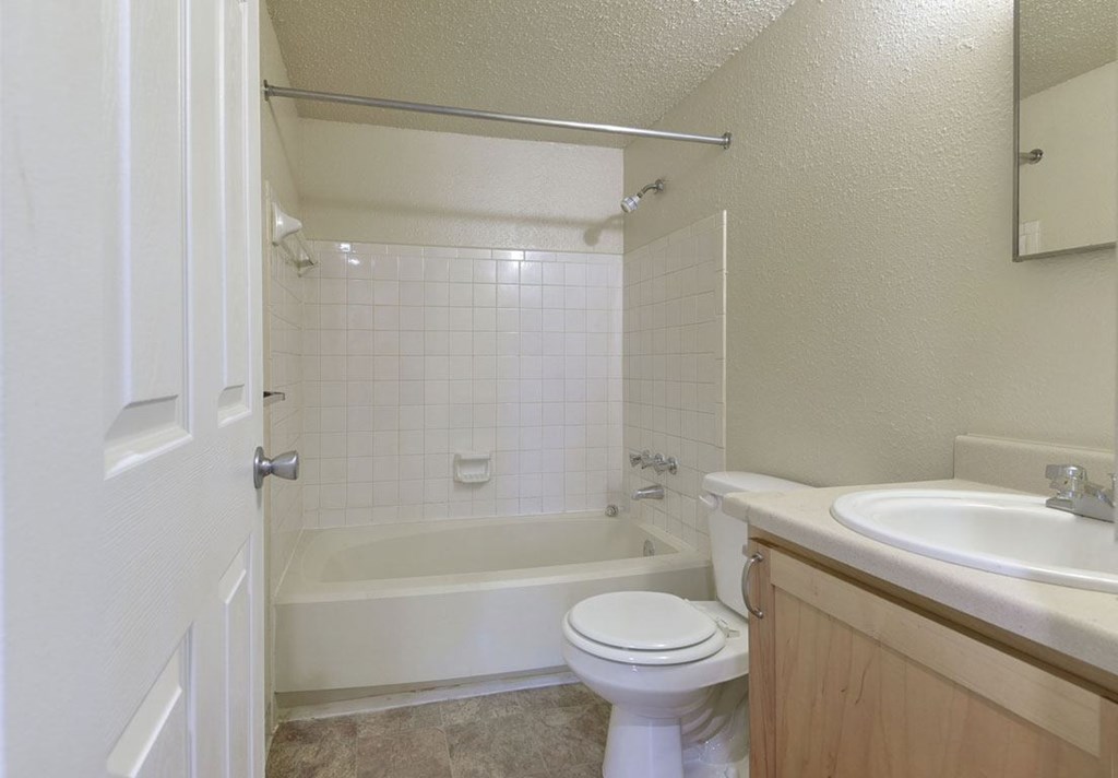 Master Bath with Shower/Tub at Old Monterey Apartments in Springfield, MO