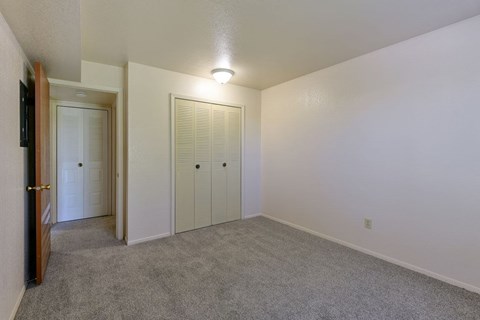 Bedroom with Large Closet at Old Monterey Apartments, Missouri, 65807 at Old Monterey Apartments, Missouri, 65807