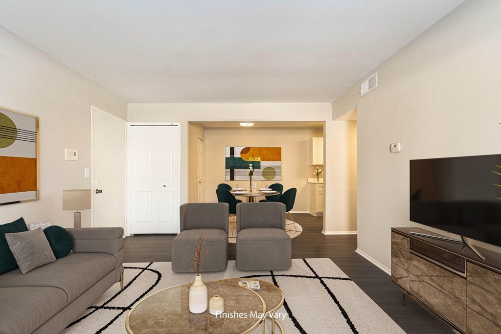 a living room with two couches and a coffee table at Cordoba Apartments, Farmington Hills, MI