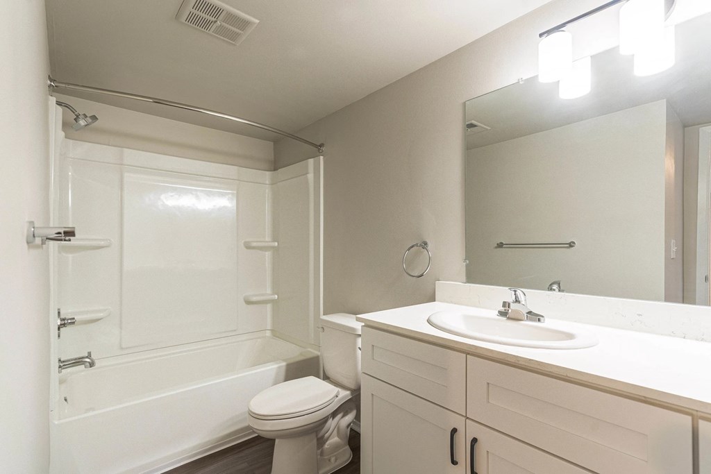 a bathroom with a sink toilet and shower at Cordoba Apartments, Farmington Hills, Michigan