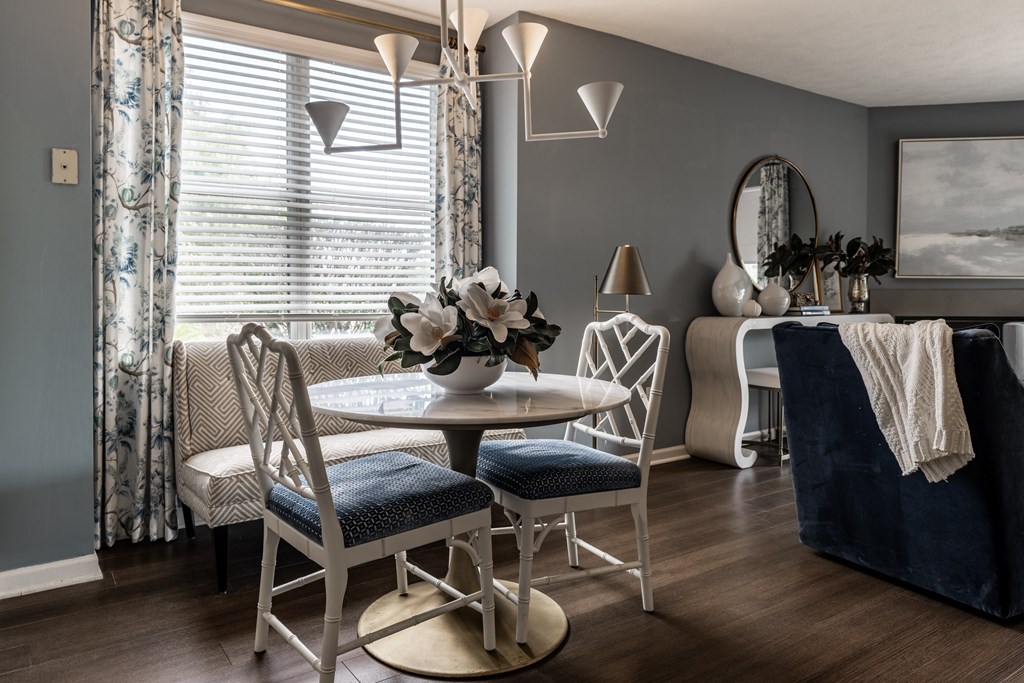 A dining room with a table set for four at Mallard Bay Apartments, Crown Point, Indiana