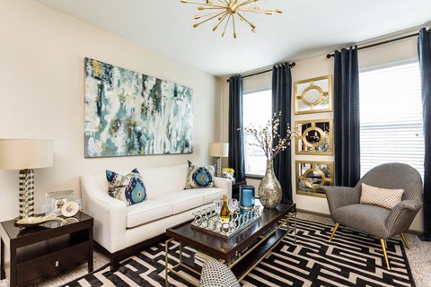 a living room with a white couch and a coffee table