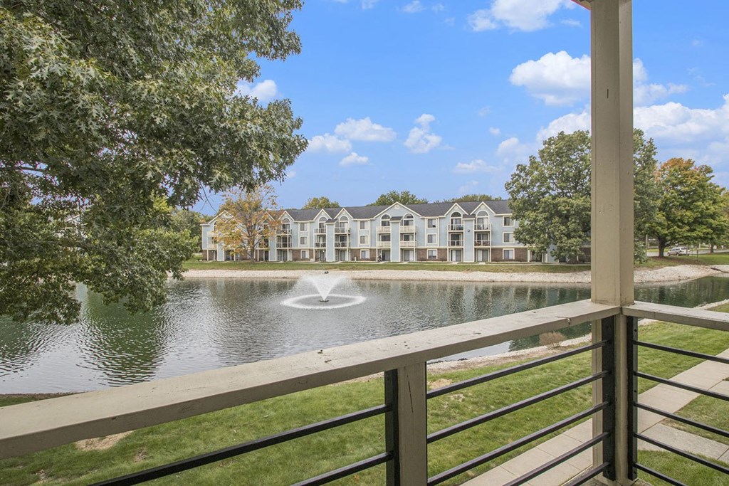 private balcony with a pond view at North Pointe Apartments in Elkhart, IN