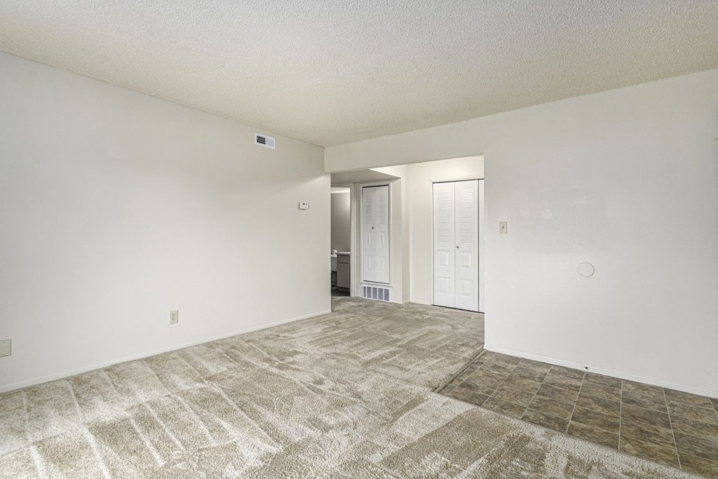 Spacious Living and Dining Areas at Normandy Village Apartments in Michigan City, IN