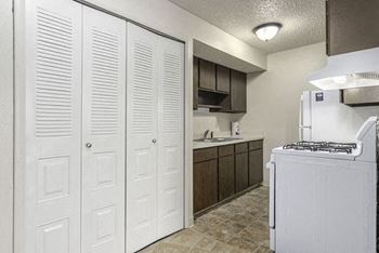 Galley-Style Kitchen at Normandy Village Apartments in Michigan City, IN