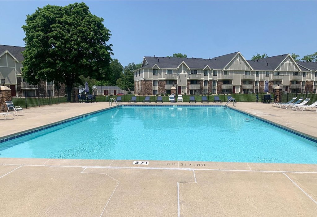 Refreshing Pool With Sundeck at Normandy Village Apartments in Michigan City, IN