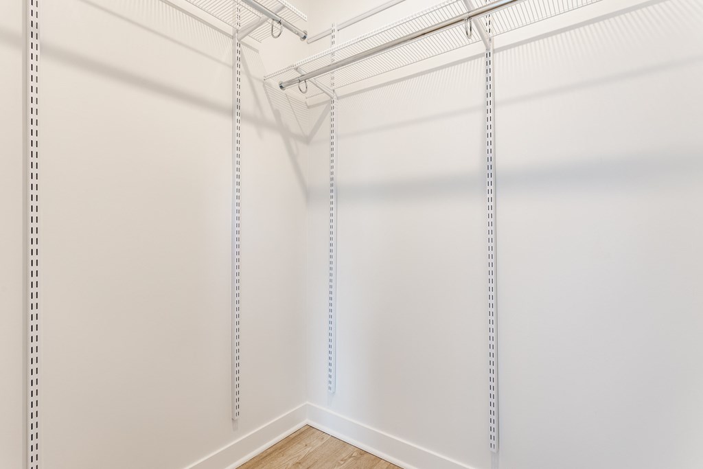 A white wall with a hanging clothesline